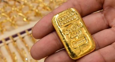 Gram altında ibre yukarı yönde
