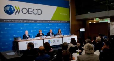 OECD, küresel ekonomi için büyüme tahminlerini yükseltti