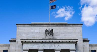 Fed, faiz oranlarını sabit tutarak başladığı 2024'ü indirimle tamamladı