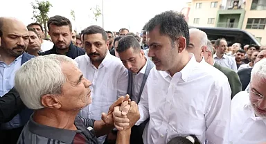 Bakan Kurum, Adıyaman'da yeni evlerine kavuşan depremzede aileye misafir oldu