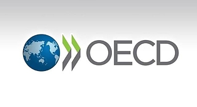 OECD, küresel ekonomiye ilişkin 2026 büyüme tahminini korurken 2027 için düşürdü